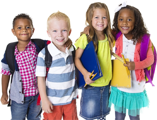 Four children smile, wearing backpacks and holding notebooks, ready for preschool or school.